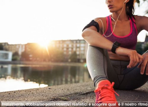 Atleta seduta al tramonto